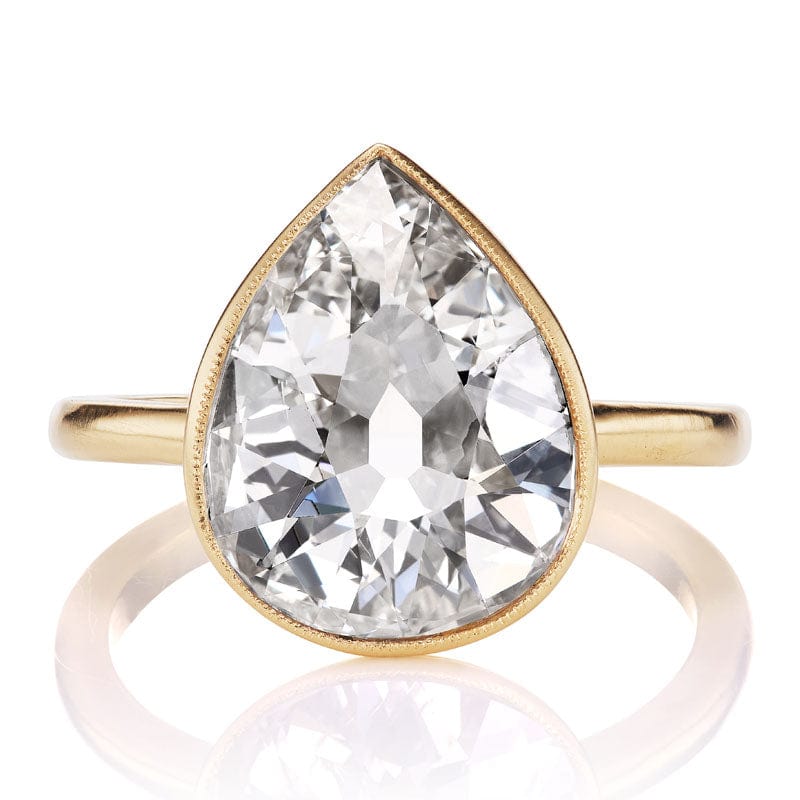 Pear Diamond in Delicate Yellow Gold Bezel Setting